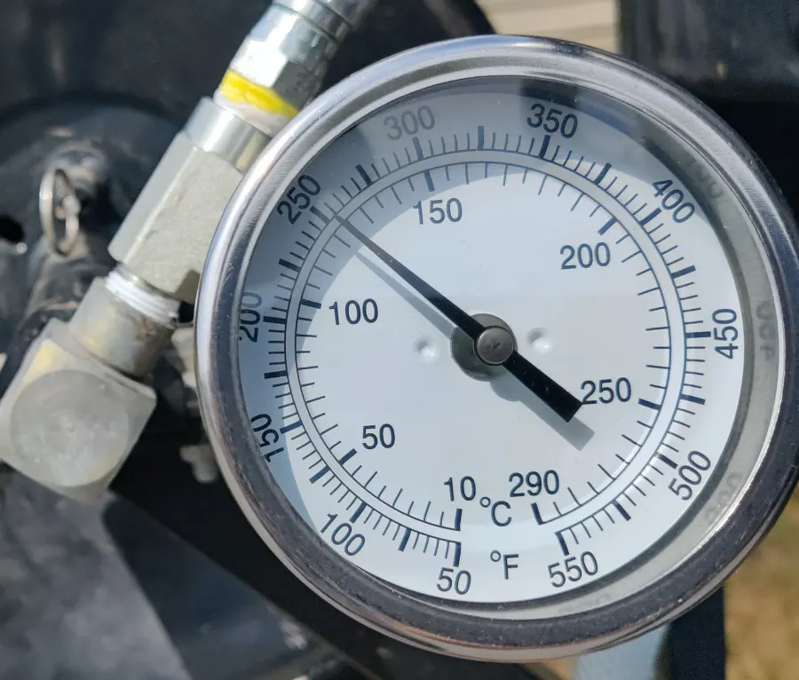 Close-up of the steam unit's temperature and pressure gauge